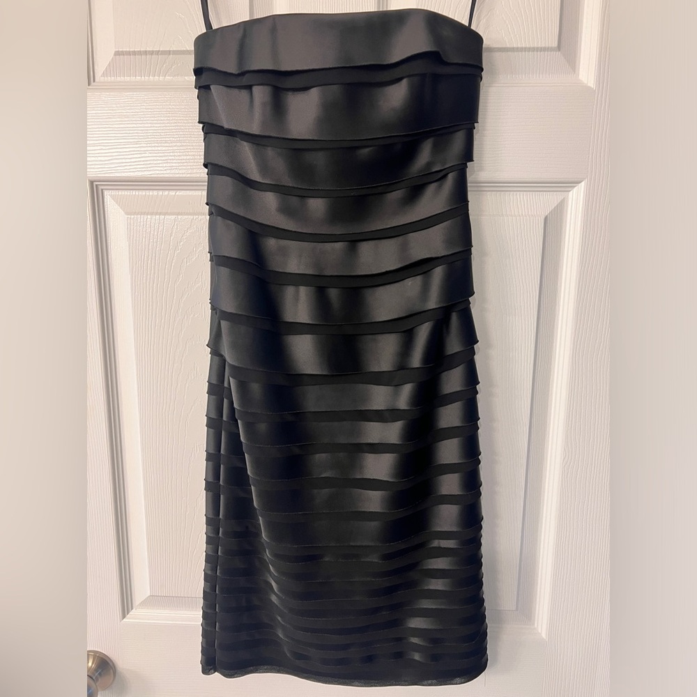 Stunning black knee length dress